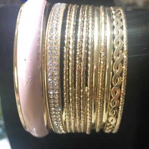 A set of 12 goldtone bangle bracelets